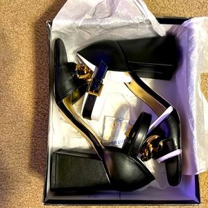 Black and gold heels